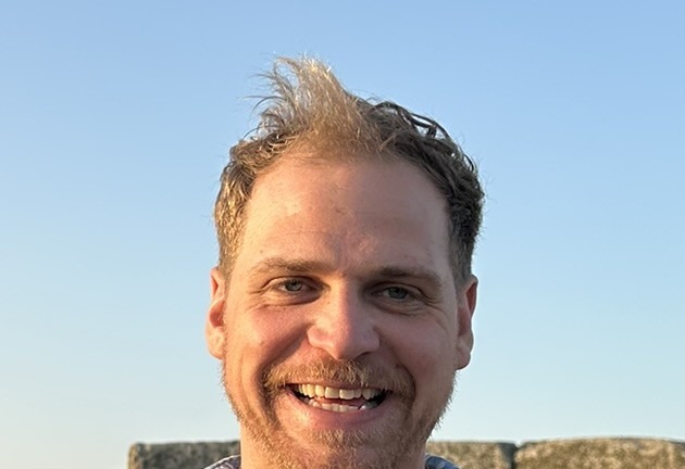Stuart Hosie, smiling in evening light